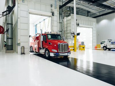 Tow Truck exiting paint booth