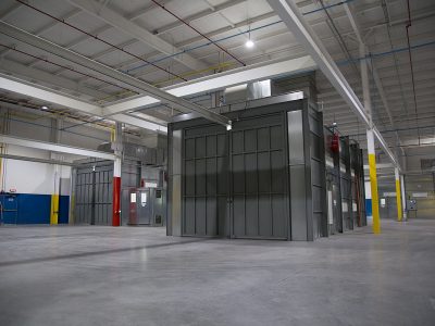 Industrial paint booth with bifold doors